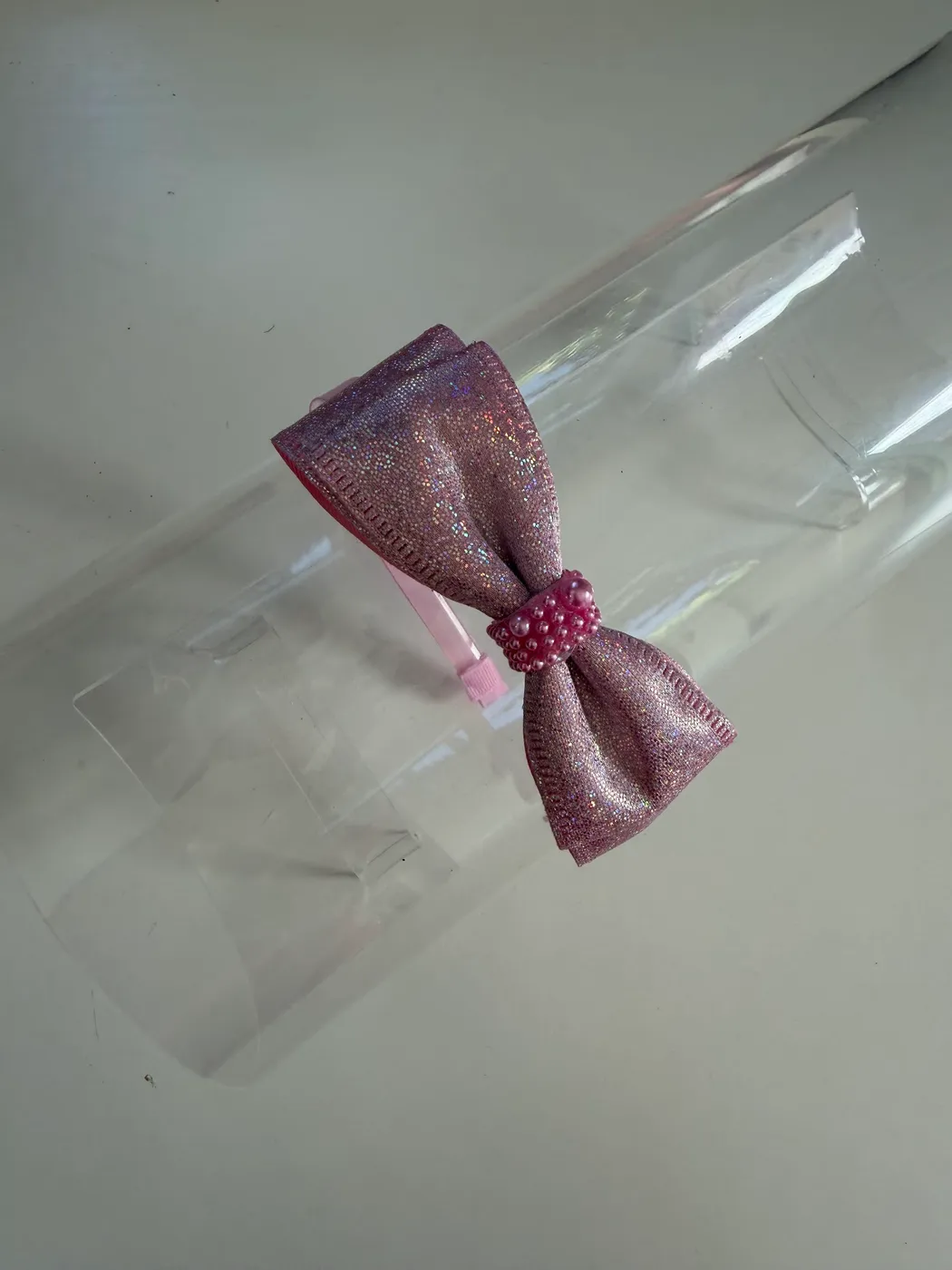 Tiara Laço Lilás Glitter com Pérola