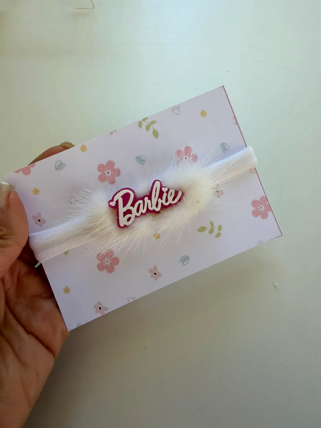 Faixinha de Bebê Barbie Branca com Pelinho